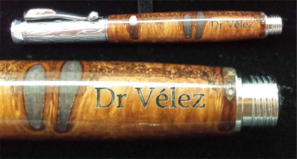 Personalized engraving on pencil of an artist of the region